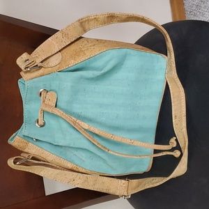 Tie top bucket bag made Artelusa from Portuguese cork. Water green in color
